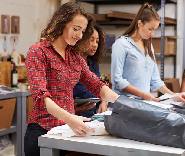 Warehouse staff manually process return orders.